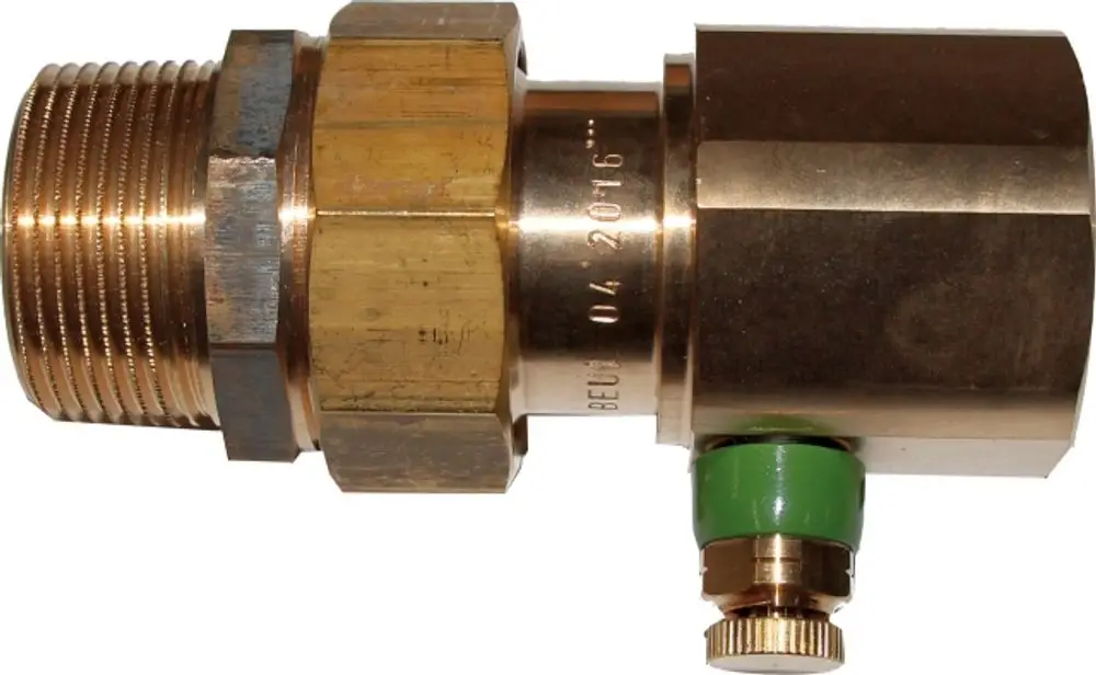 Rückschlagventil mit metallener Oberfläche und grünem Ventilkopf, hergestellt von Wolf, zur Verwendung in Trinkwassersystemen.